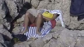 I caught one sassy babe and her trimmed pussy sunbathing on the beach