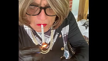 CD Nikki smokes with Hello Kitty osntied