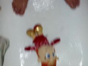 In the Shower Playing with a Plush Elf