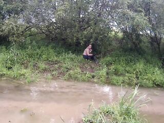 cutie has pleasure in the mud in a blue suit