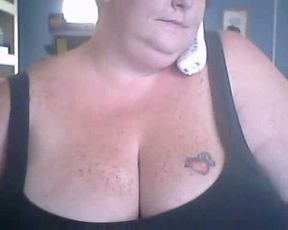 White trash BBW mommy talks with her hubby and shows me her rack