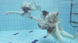 2 clothed beauties underwater Anna Netrebko and Lada Poleshuk