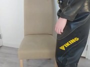 Putting on heavy rubber Viking drysuit, gasmask, latex mask and condom