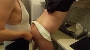 Riding with a strapon in the kitchen