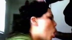 Raven-haired slut smoking cigarette while sucking BBC