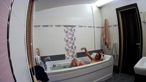 Stella relaxing in the bathtub