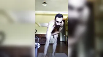 Solo Spanish hunk spreads ass and jerks his big uncut cock