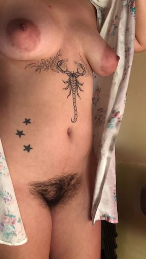 Hairy amateur teen flaunts her tits and shows off her bushy pussy.