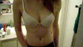 My skinny petite redhead GF in the bathroom in her bra