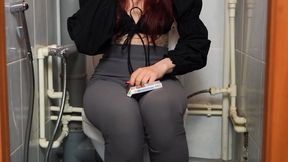 Adelina is smoking All White Super Slim Vogue cigarette in leggings on the toilet 2 | 4k video resolution