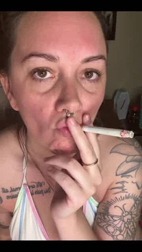 Chery Trees smoking in a bikini