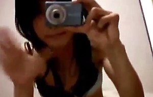 Horny teen ladyboy yanking cock at the mirror