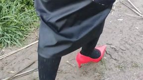 Muddy red heels licking