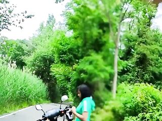 BIKER FEMALE BLACK SOLO PUBLIC MOTORCYCLE NYC OUTSIDE PARK