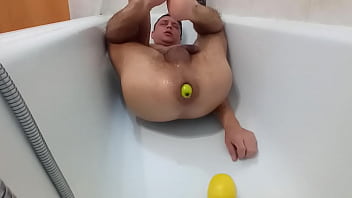 Stretching the ass with an apple and a lemon