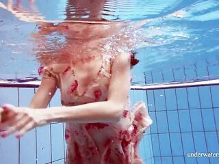 Martina pretty redhead teenie large bazookas swimming