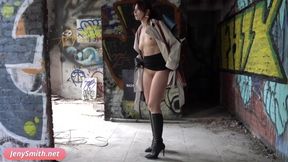 Jeny Smith stripped bare exploring the warehouse while flashing her massive tits
