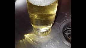 Plenty of strong yellow piss into a glass
