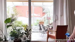Hot brunette housewife shows off naked ass while cleaning windows