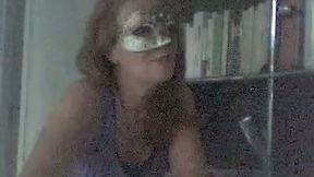 Sexy webcam girl in mask is talking about sexual desires