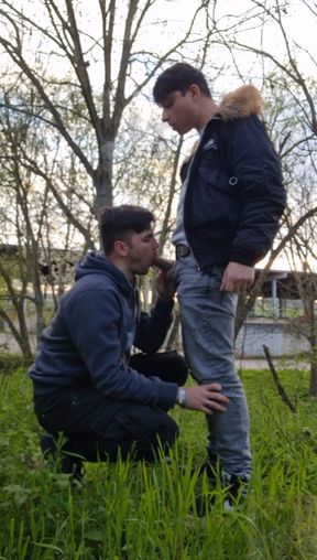 Two hot boys with big dicks smoking, wanking and sucking outdoors