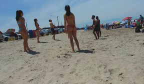 red bikini brunette teen round booty playing volley