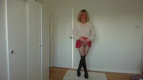 Short skirt, boots and fishnets