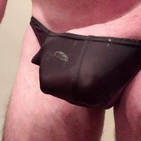 Jerking cock in black thong