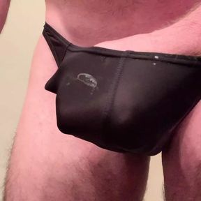 Jerking cock in black thong