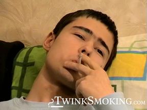 Young Marivelli hops on the couch and starts his smoking and jerking session