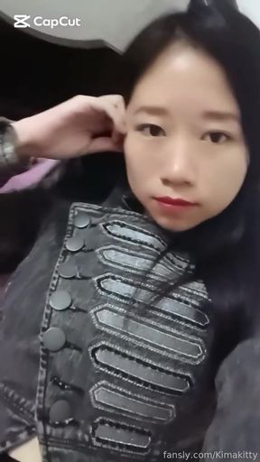 Asian girl in black leather jacket
