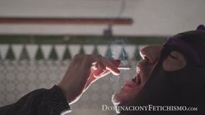 DOMINA DAMSEL relaxes by smoking and using her HUMAN ASHTRAY
