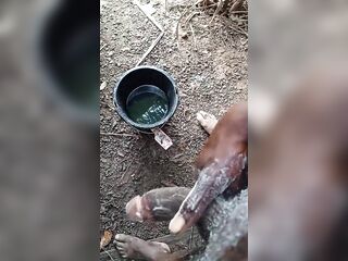 A boy masturbating inside his bathroom with soap