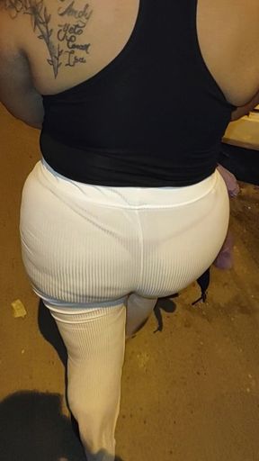 Mature Wearing Red Thread in Sheer Leggings Caught on the Street