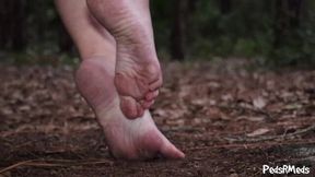 Renee Quinn Rubs Her Feet in Dirt
