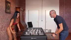 hot brunette loses soccer match and pays her bet.