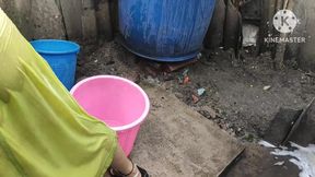 Indian house wife bathing