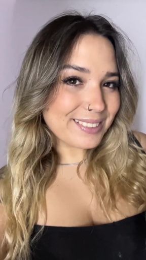 Smiling woman in black tank top