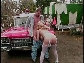 Busty nurse gets her pussy licked in her uniform outside