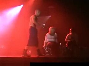 Two amateur women suck stripper on stage