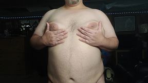 Chubby guy playing with tits