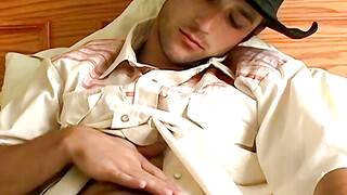 Hottie Cody lights his red cig while stroking his pinkish cock