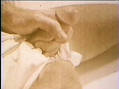 Well-endowed homeowner gets a blowjob from a horny salesman in this vintage video