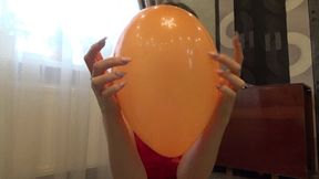 Popping balloons with long nails