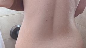 Solo female soaps up her hot body in the shower