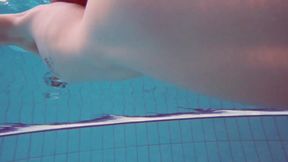 ”Half euro beautiful babe taking swimming classes in public pool”