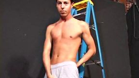 Ryler Jackson decides to take a break from painting and beat off. After stripping naked, the young man strokes his cock with determination, edging himself a few times, before blowing a cum load onto his stomach.