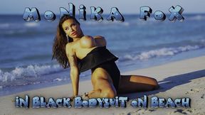 sexy monika fox in black bodysuit on beach