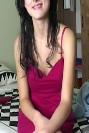 Brunette in Pink Dress Teases on Bed