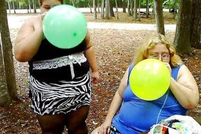 2 bbws are balloon blowing and popping